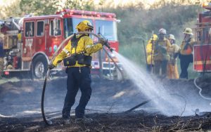 Fire crews tackle house fire in Soledad Canyon