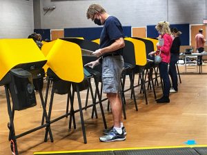 First-time voters hit the polls despite pandemic