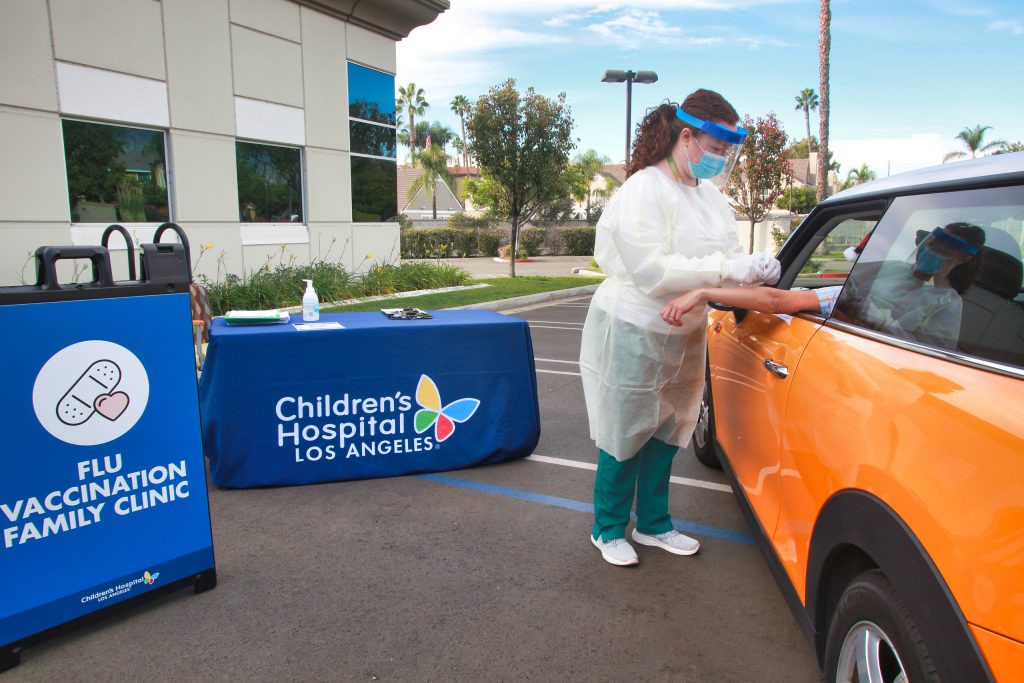 Children’s Hospital Los Angeles holds drive-thru flu vaccination clinic in Valencia