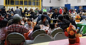 Residents enjoying the Newhall Thanksgiving community dinner