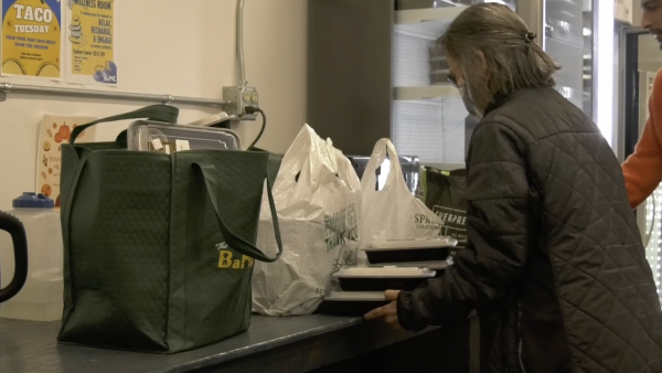 Volunteer preparing meals for students at the BaNC.