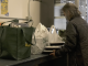 Volunteer preparing meals for students at the BaNC.