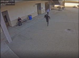 ‘Peeping Tom’ caught on video running away from Womens’ restrooms