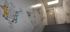 Graffiti continues to cover the third-floor stairwell in Mentry Hall